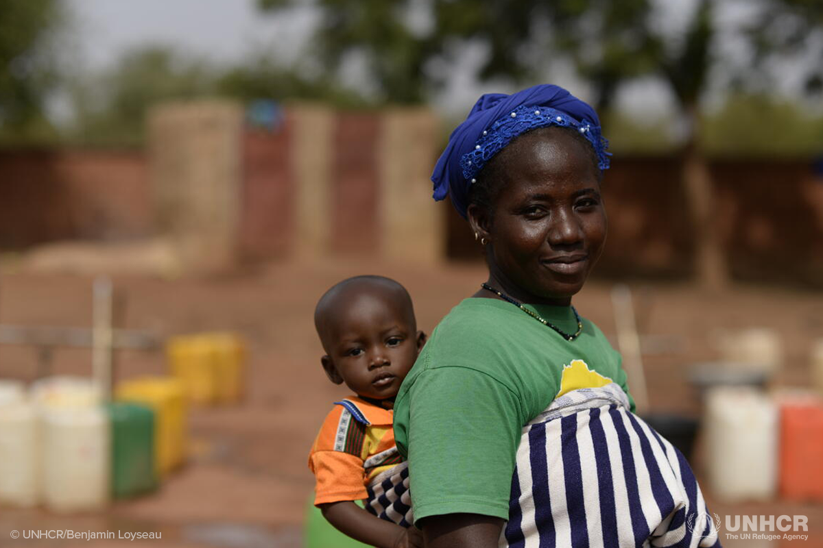 Mairama carries her son in a wrap at a site for internally displaced families in Ouahigouya northern Burkina Faso