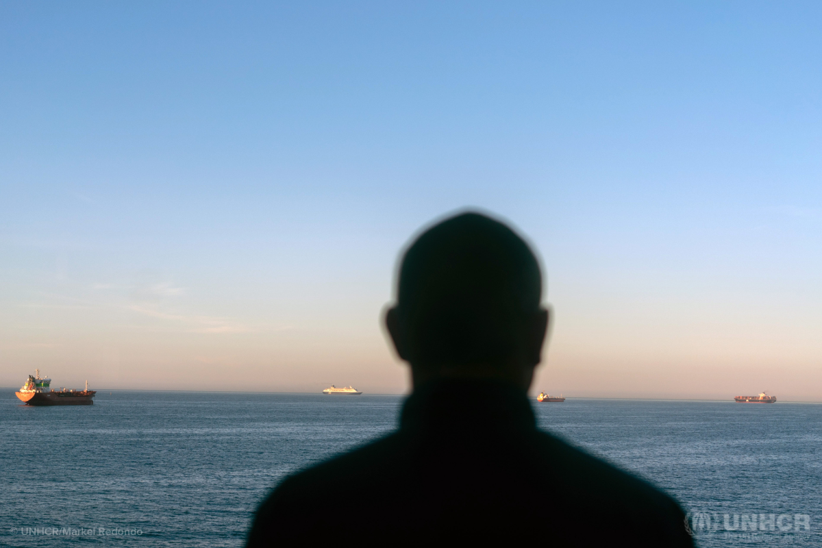 A man looking at the Mediterranean sea