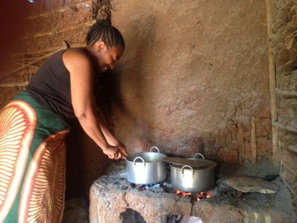 Congolese refugee Masika tends to a bubbling stew in her restaurant in Ethiopia's Sherkole camp. © UNHCR Photo Uni