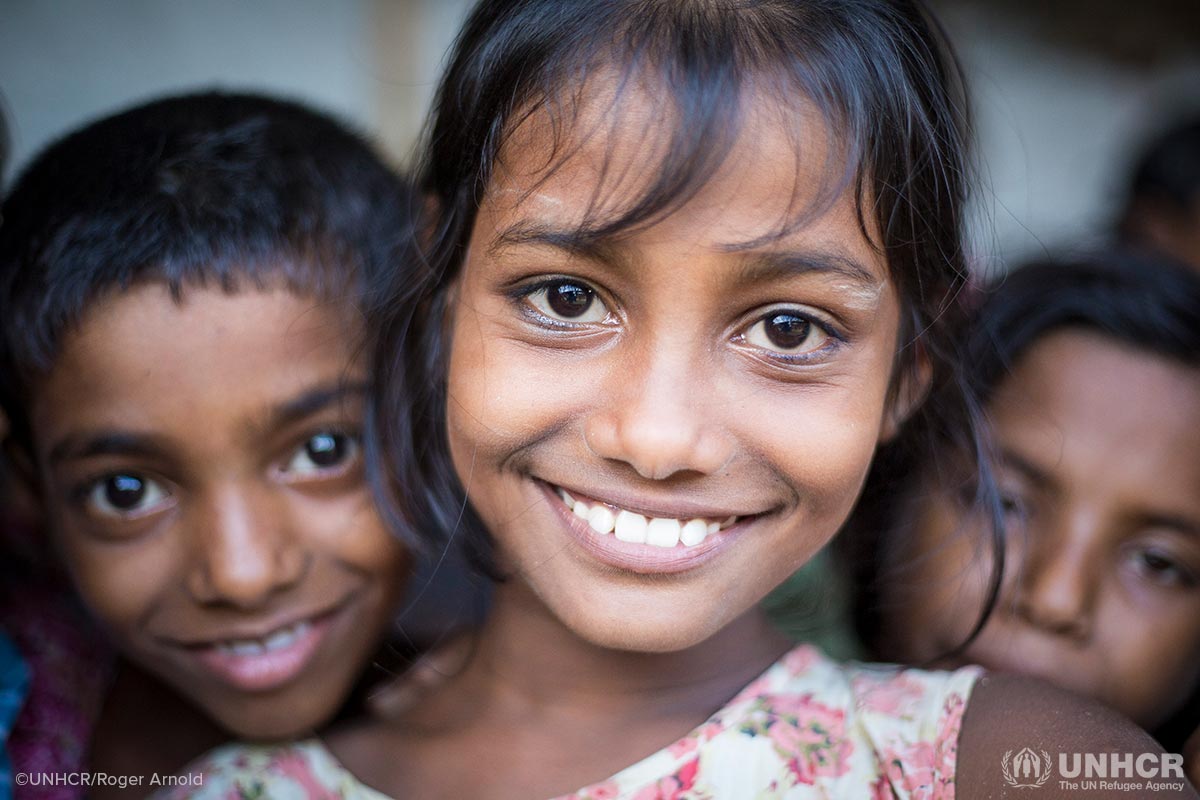 Smiling children in a Rohingya refugee camp