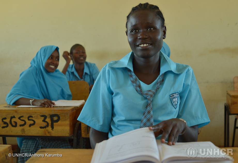 18-year-old South Sudan refugee Esther Nyakong sits in a classroom in Kenya.