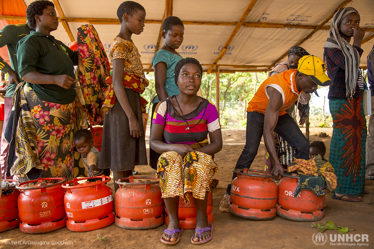 Burundian refugee Frida Nehebauwayo, 17, lines up to have her LPG cylinder refilled at Nyarugusu camp in Tanzania