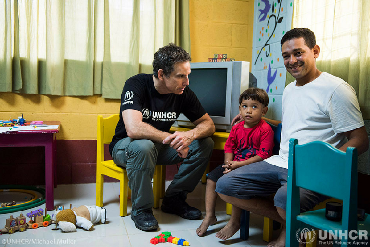 Ben Stiller sits with child in Guatemala