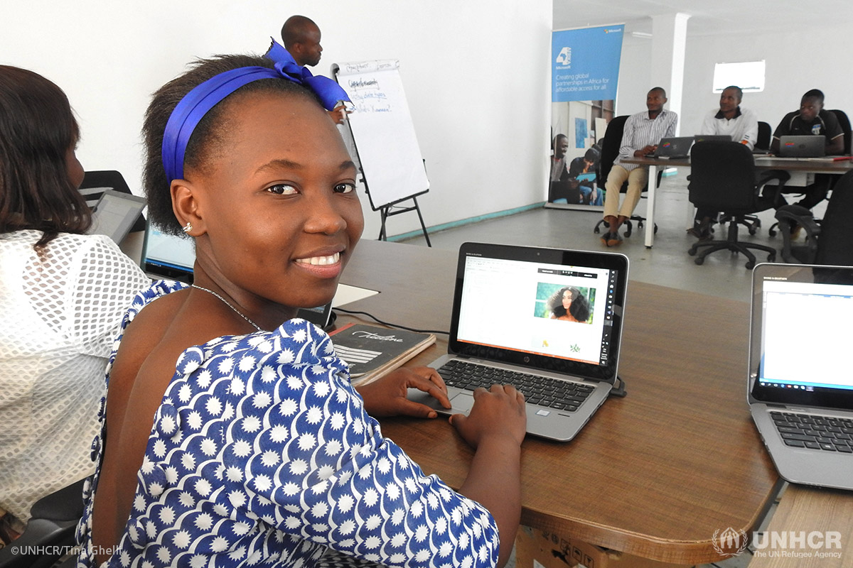 Henriette Kiwele Kiyambi, age 21 from the Democratic Republic of Congo, working on her Natural Beauty app at the App Factory in Dzeleka refugee camp in Malawi.