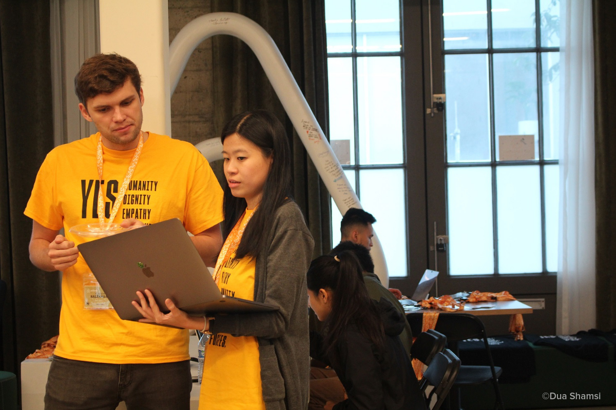 Photo of two data scientists at the hackathon