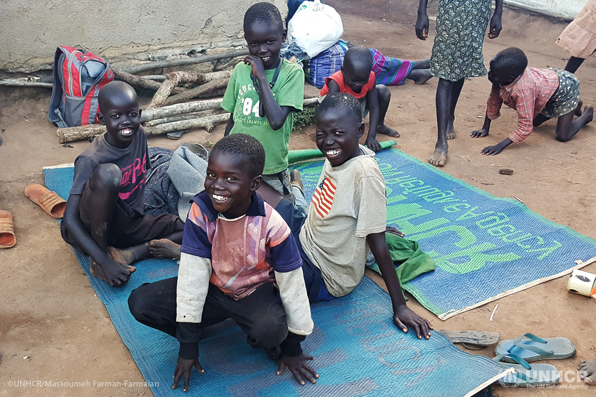 South Sudanese children can smile after fleeing renewed fighting between government and rebel forces in mid-2016 and reaching safety in neighboring Uganda.