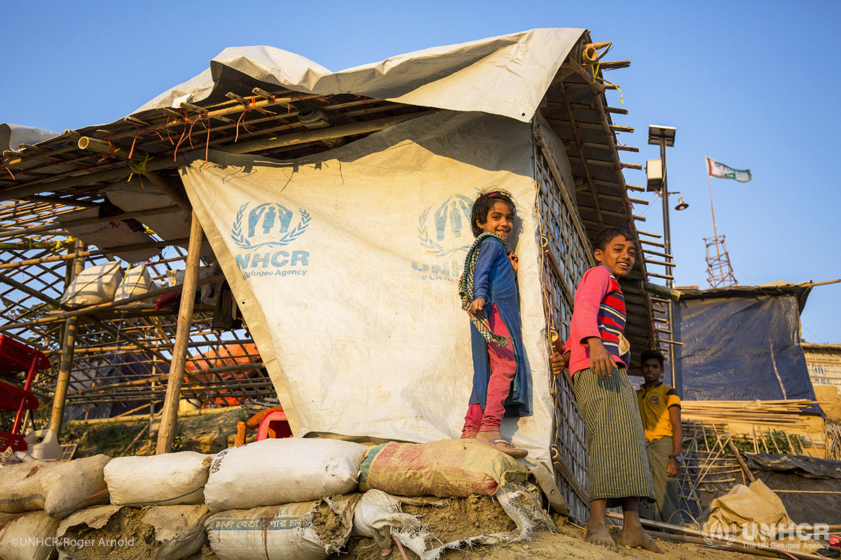 Rohingya refugees prepare for the monsoon by building new reinforced shelters with materials supplied by UNHCR.