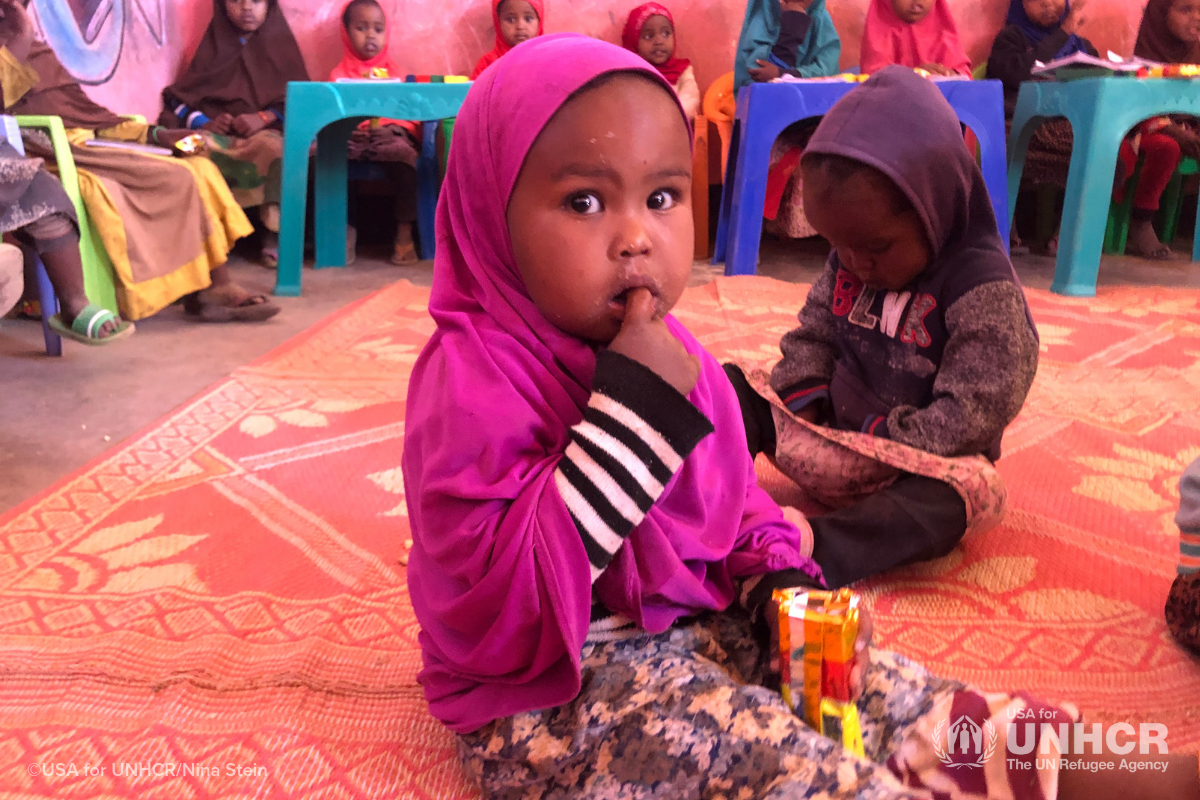 Little girl in pink, a refugee in preschool in Ethiopia