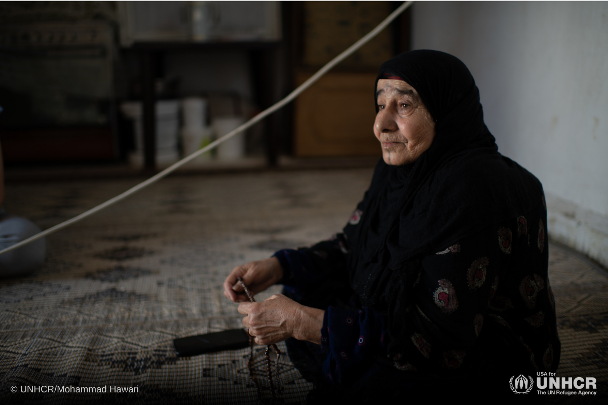 Yaze, a 60-year-old Syrian refugee from Raqaa, sits at home in Amman, Jordan.