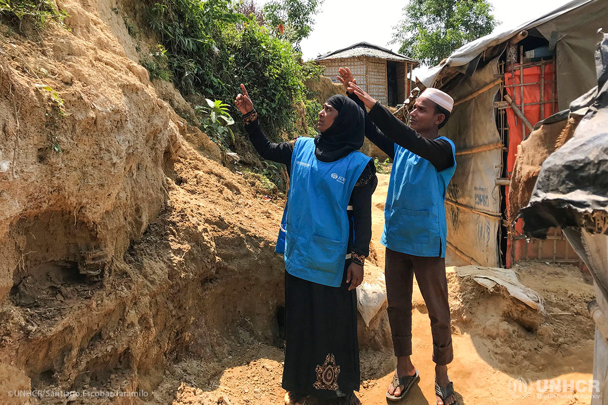 Rohingya refugees, Mohammed Anwar, 25, and Khalida Begum, 30, are Safety Unit Volunteers. They are first responders and work with UNHCR partner ADRA in emergency preparedness at Chakmarkul settlement.