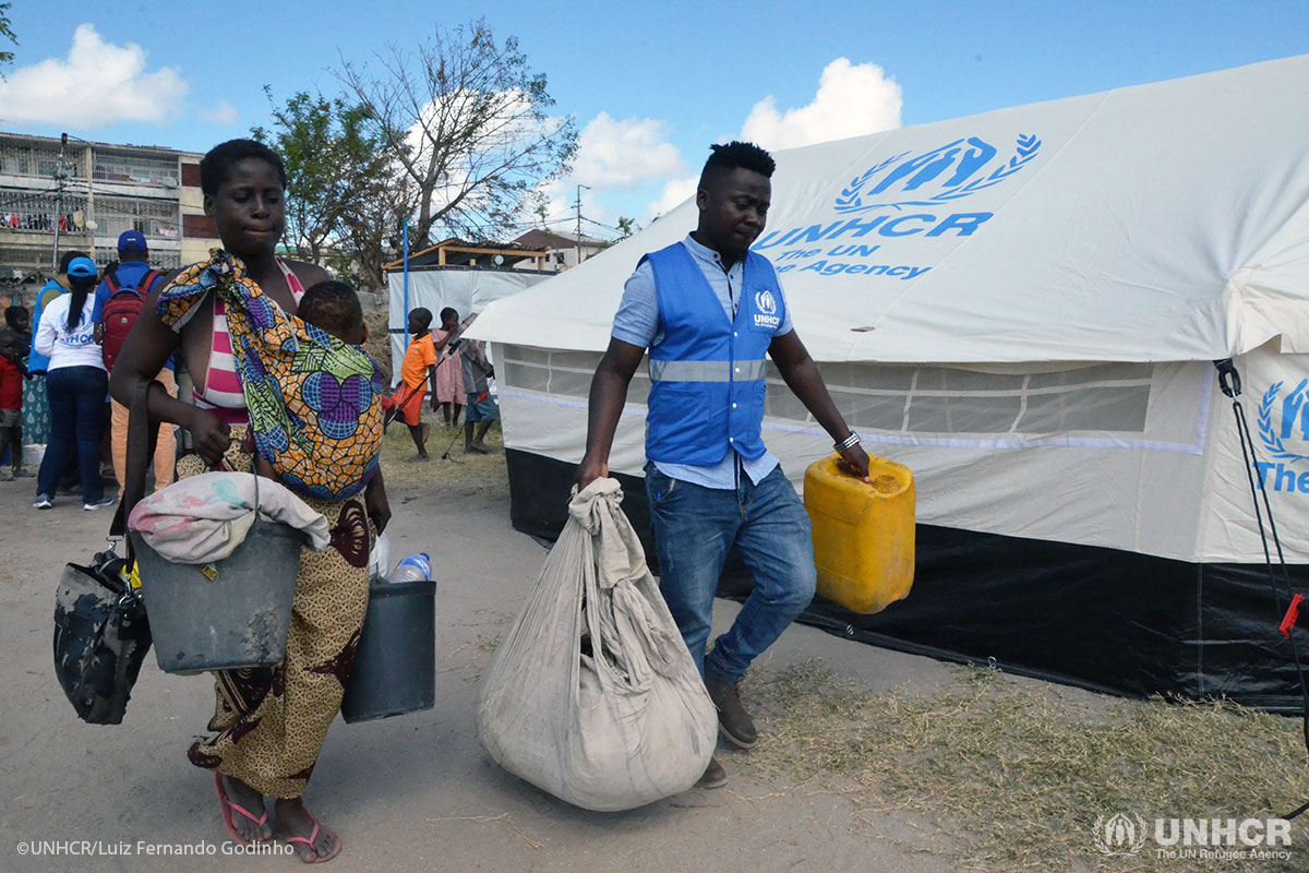 Kitungano Kinga, a refugee from the Democratic Republic of the Congo, helps displaced people in Beira, Mozambique to relocate after Cyclone Idai.