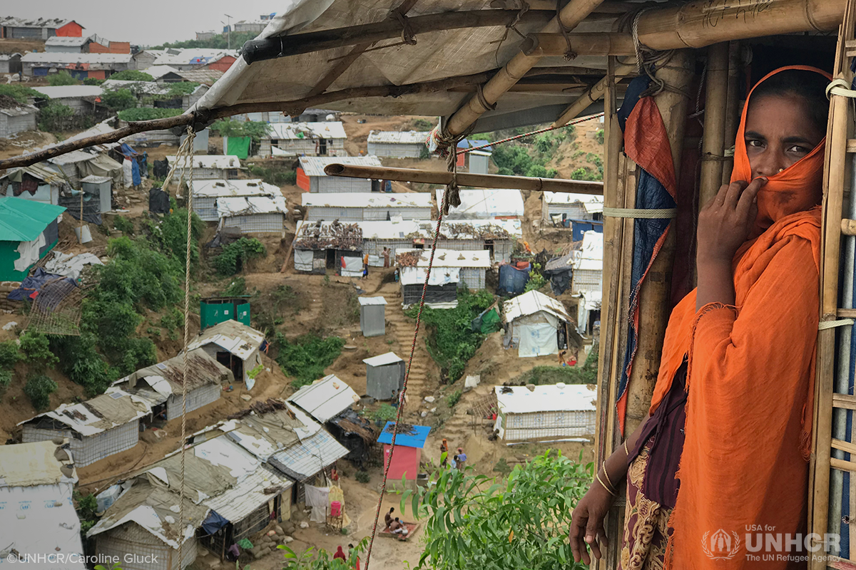 bangladeshi woman looking out from her shelter at the chakmarkul refugee settlement