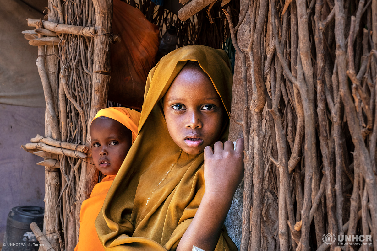 two somali refugee children looking at camera