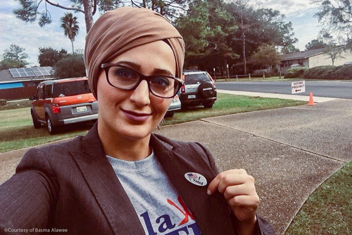 Basma Alawee wearing Just Voted sticker