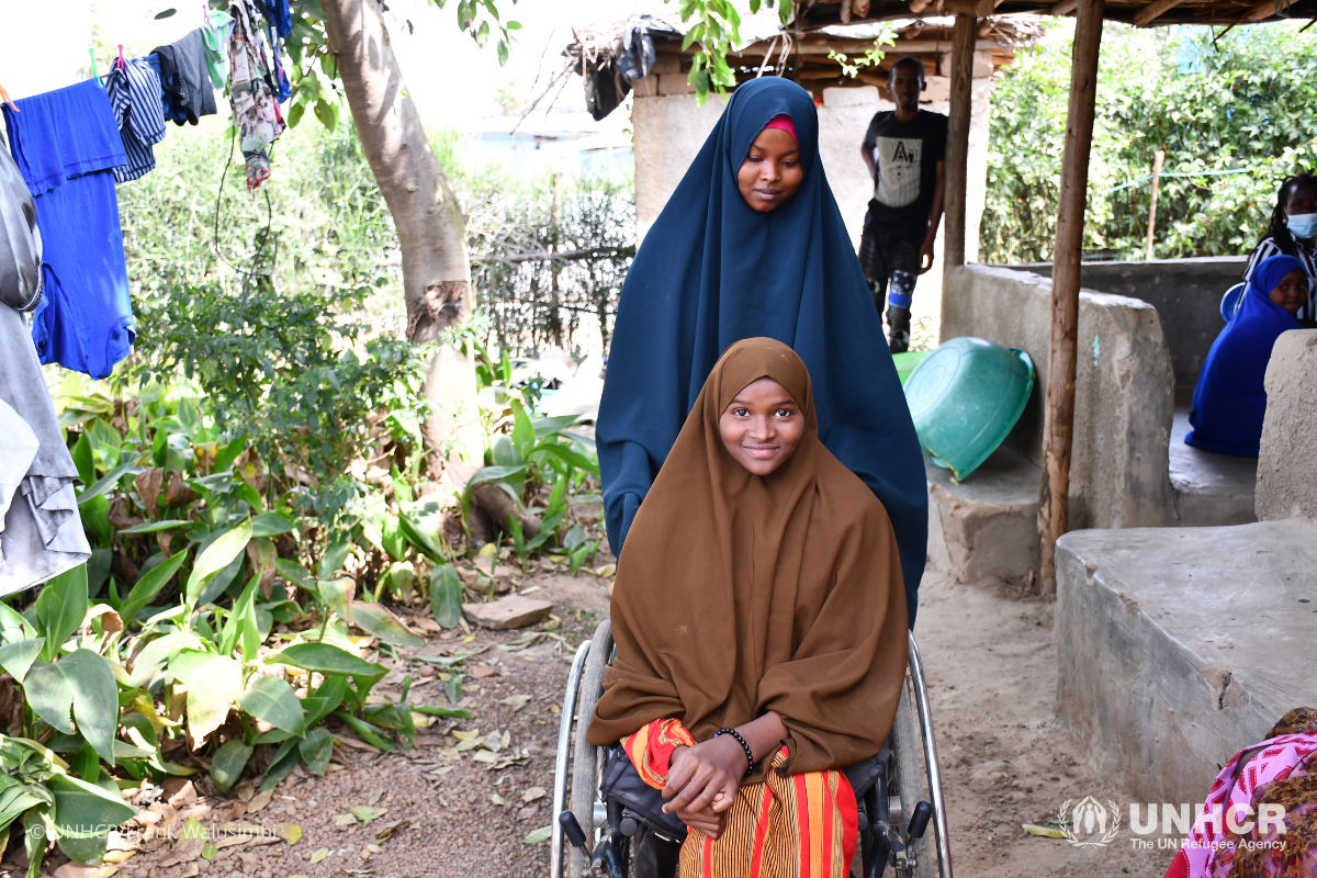 Asma (in the wheel chair) and her sister, Aminah live with their step mother their stepmother Habibah.