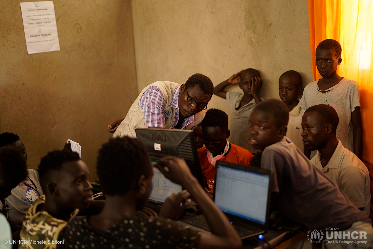 students in uganda use computers for class
