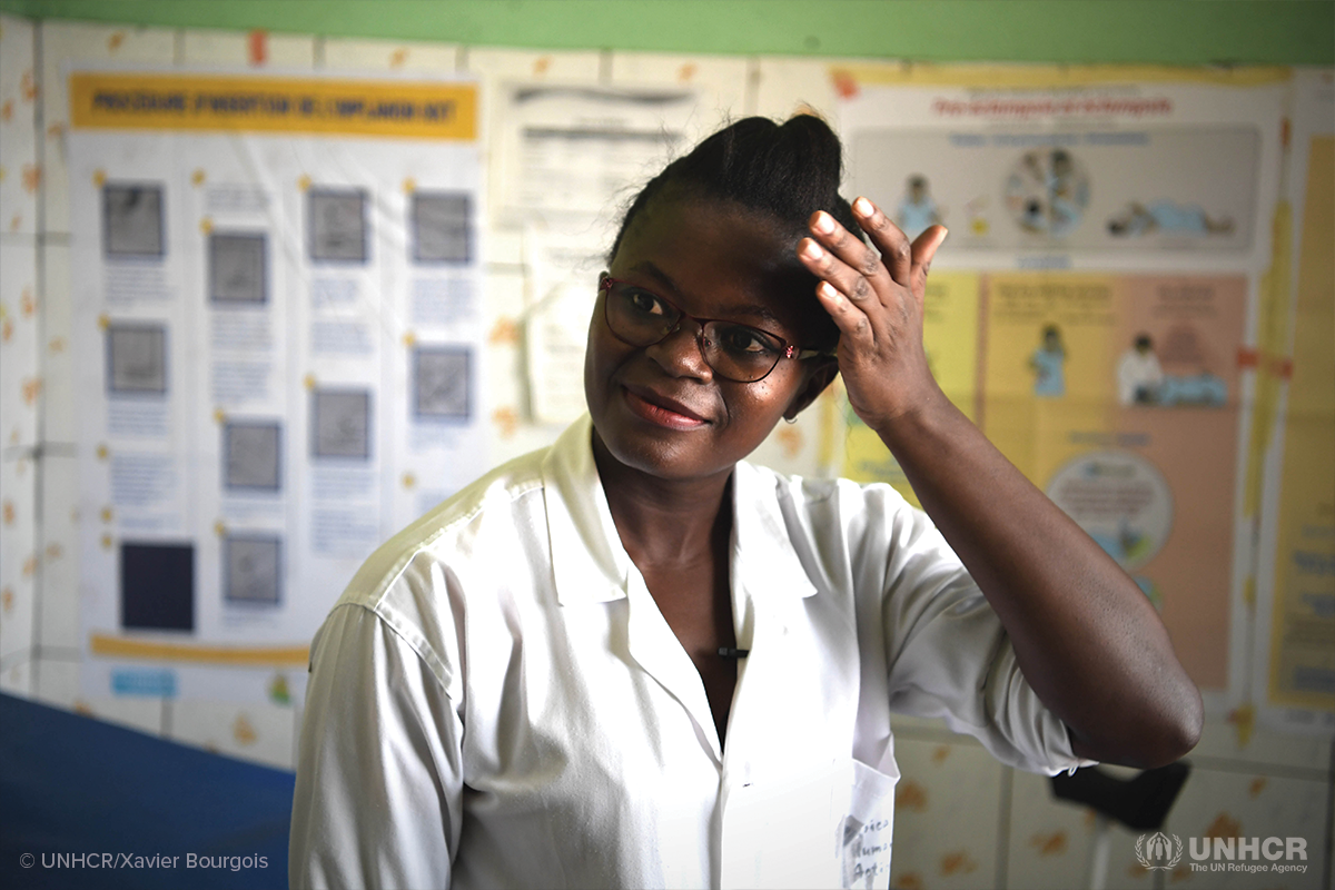 portrait of midwife in cameroon