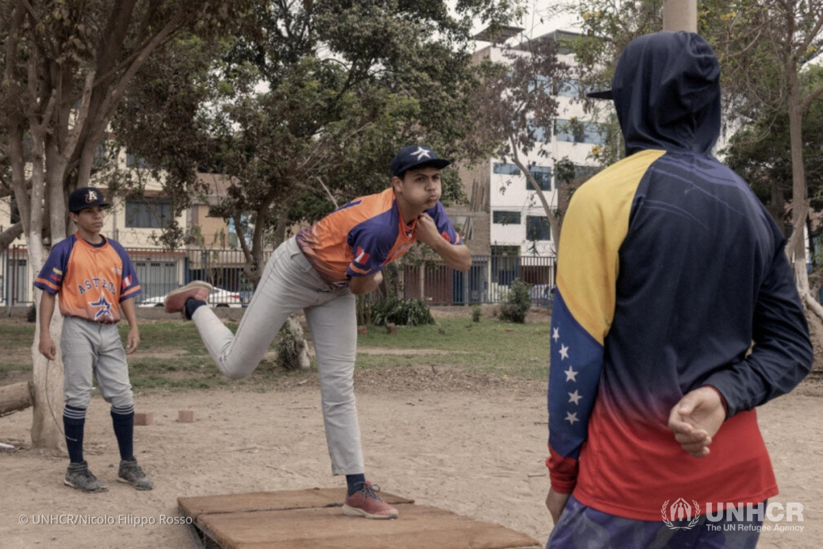 Players practice their pitching skills at the park in the San Juan de Lurigancho district in northern Lima, Peru, where Los Astros train.