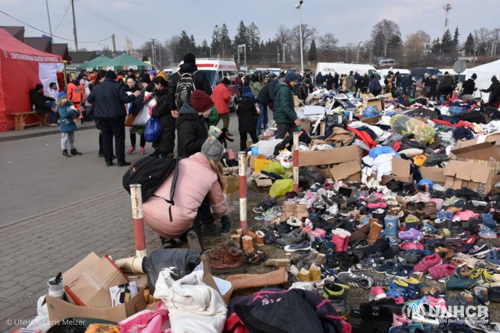 Donations from Polish residents are offered to refugees close to the Medyka border crossing.