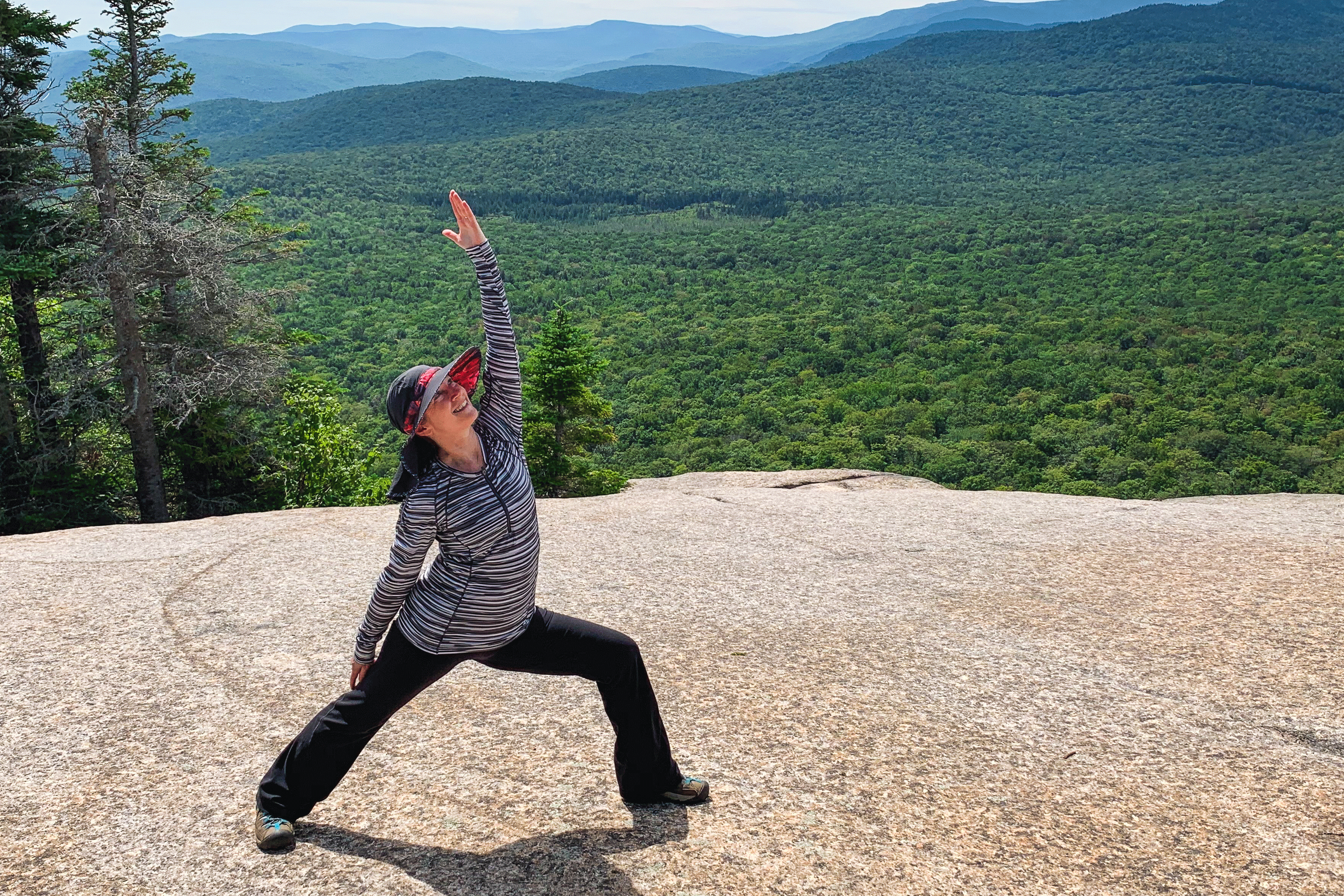 regina doing yoga in the mountains