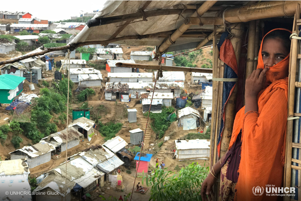 Rohingya women looks outside her shelter as heavy wind and rain causes landslides, flooding and damage to property in Cox's Bazar, Bangladesh