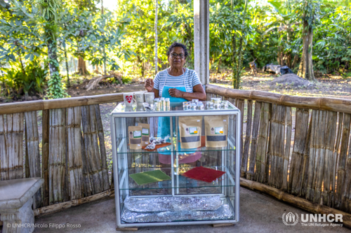 Vicenta González, 73, from Nicaragua, oversees a display of products made by the all-female collective Cacaótica.