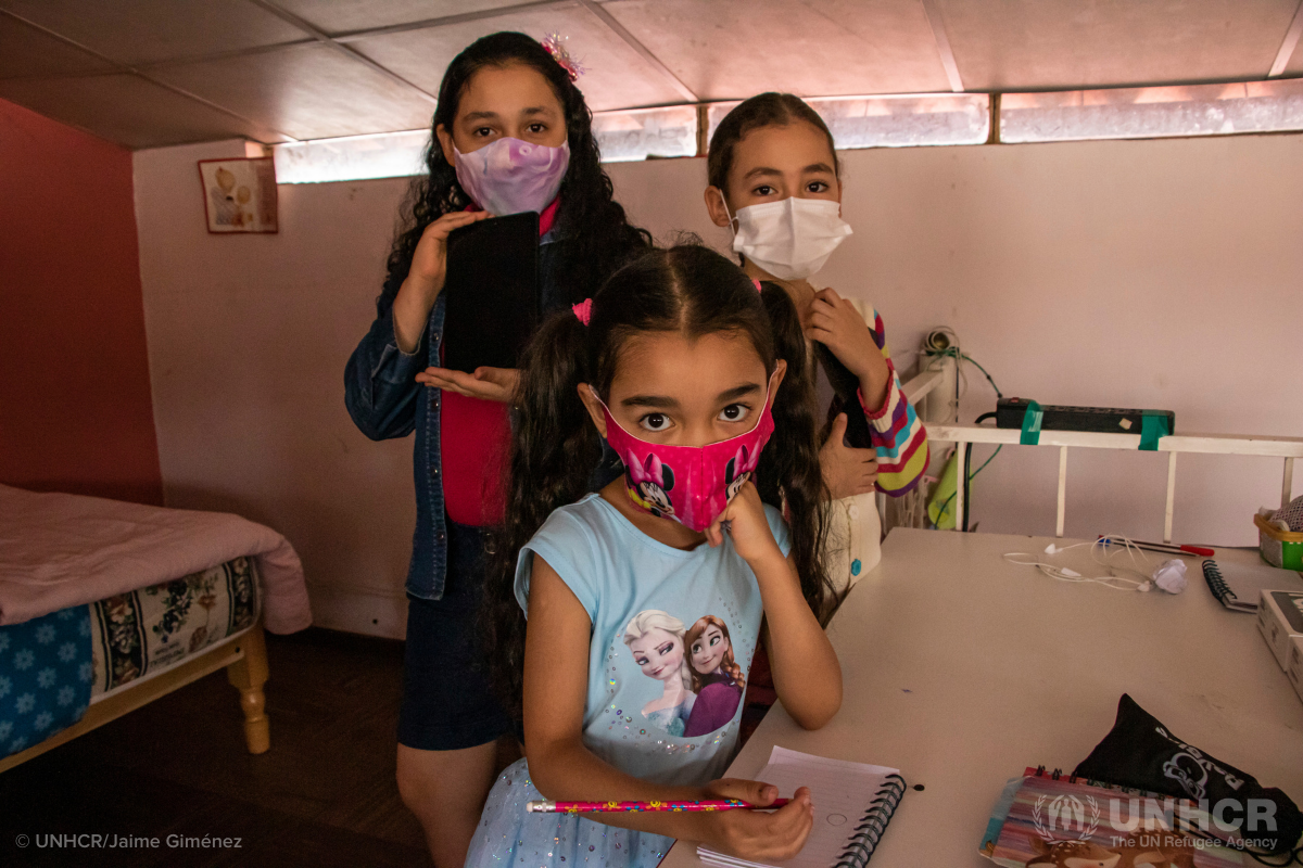 Venezuelan sisters do school work in COVID-19 pandemic