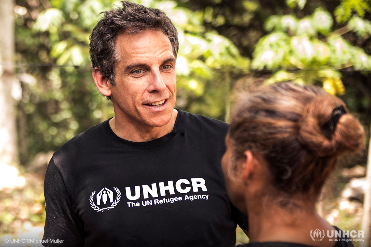 ben stiller speaking with a refugee woman from guatemala