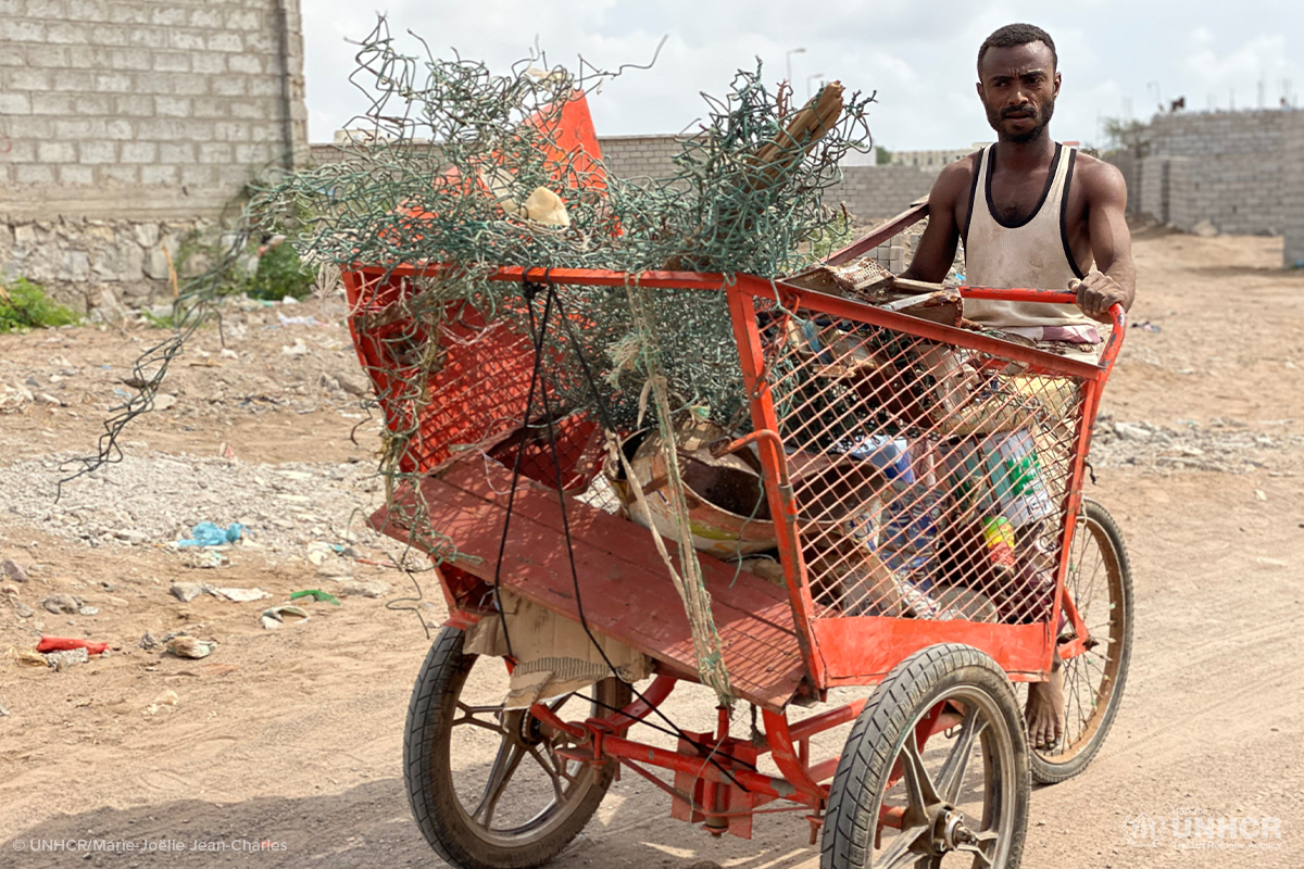 said collects waste using a tricycle cart