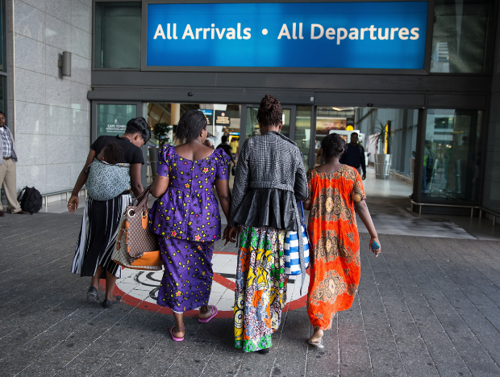 A Congolese family heads to a new life in France, Cape Town International Airport, South Africa
