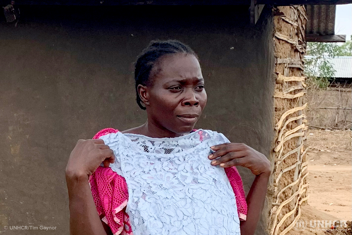 Congolese refugee Clementina Naba receives clothing donation from Gap and Hanes