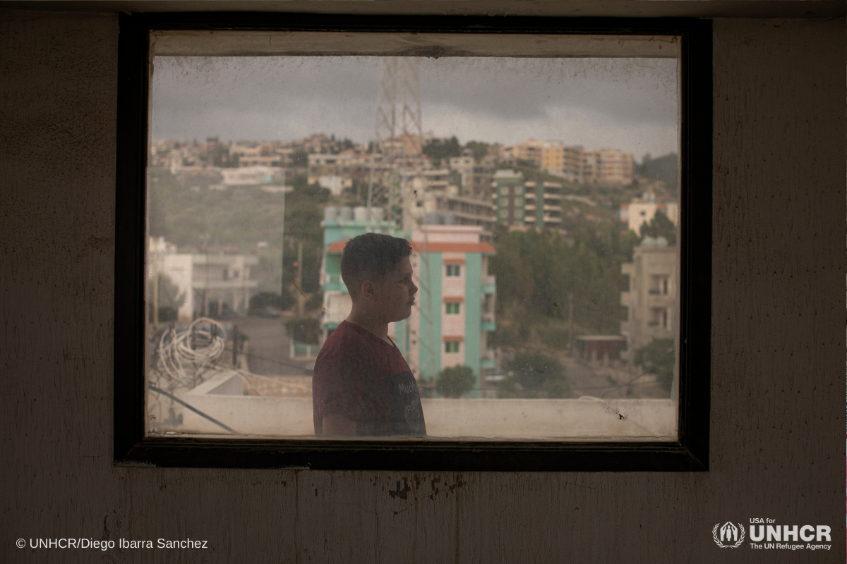Syrian-boy-window