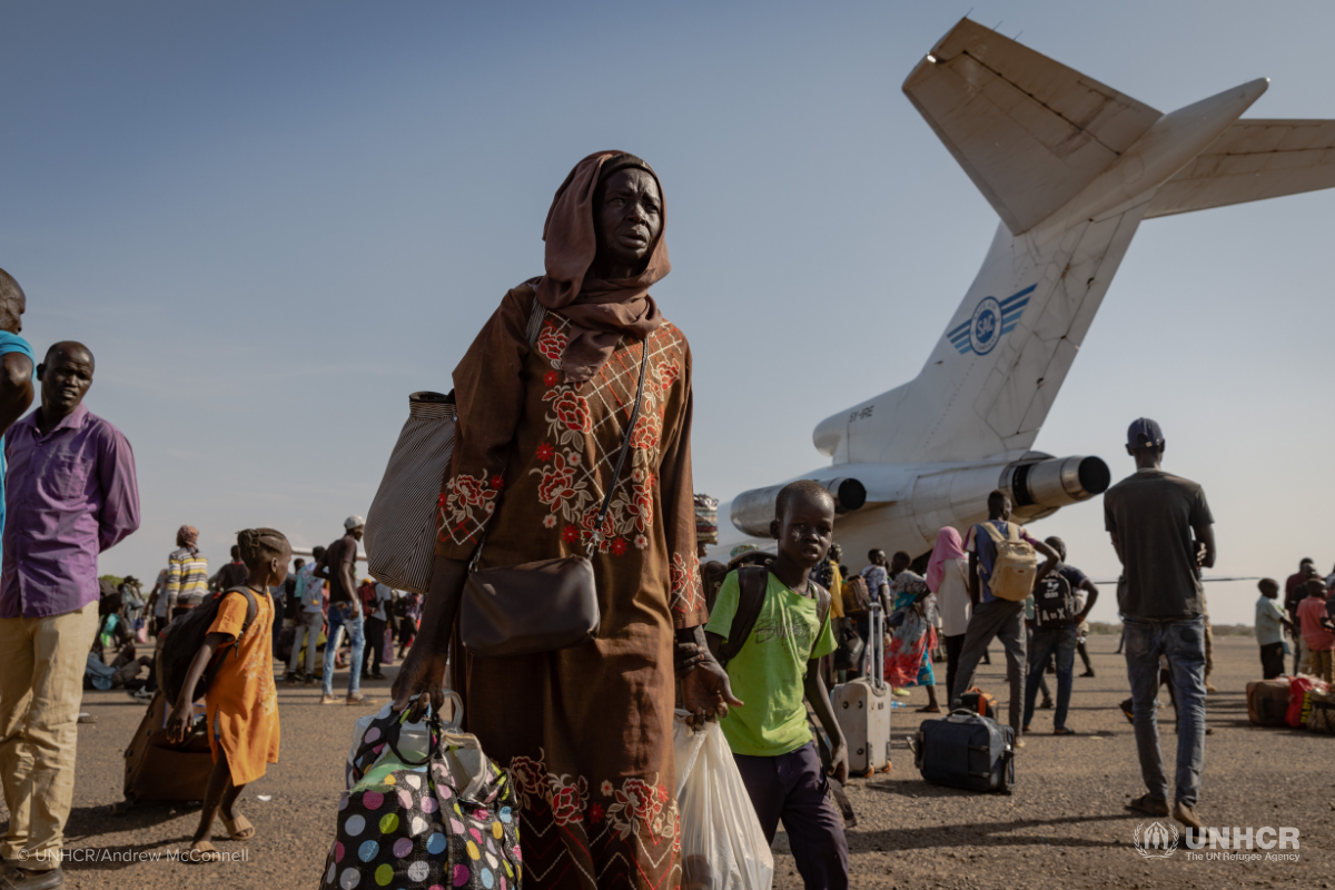 South Sudanese woman fleeing conflict in Sudan
