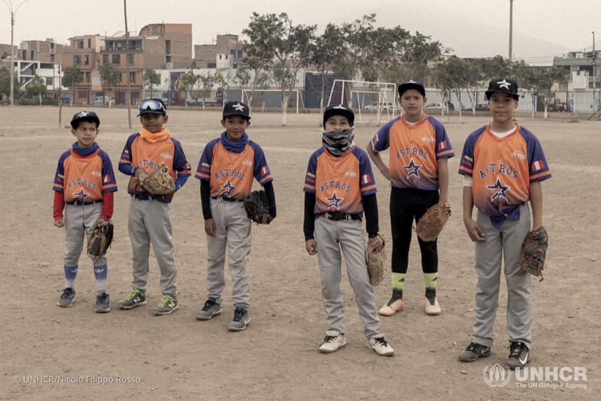 Young Venezuelan-born members of Los Astros baseball club attend practice at a park in the San Juan de Lurigancho district in northern Lima, Peru.